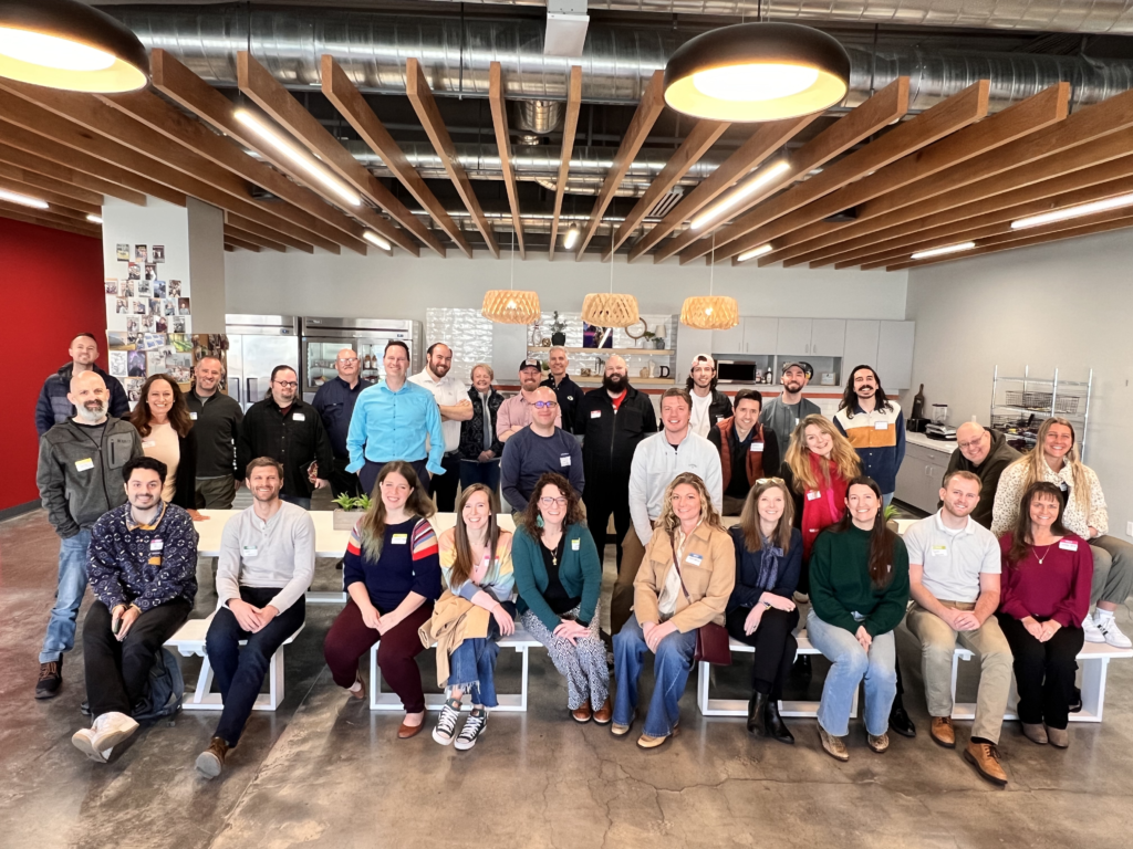 Group photo of Utah Marketing Group members sitting and standing in rows.