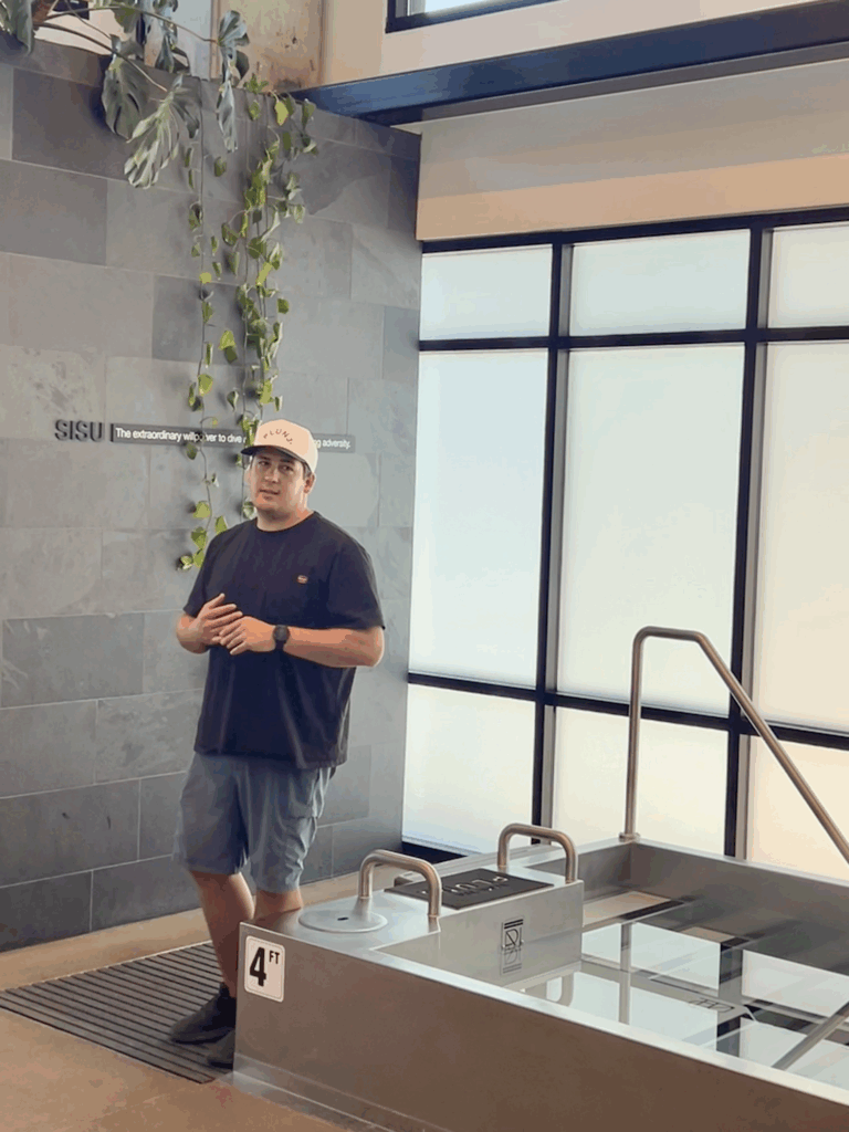 Utah Marketing Group member standing next to a cold pool at PLUNJ Salt Lake.